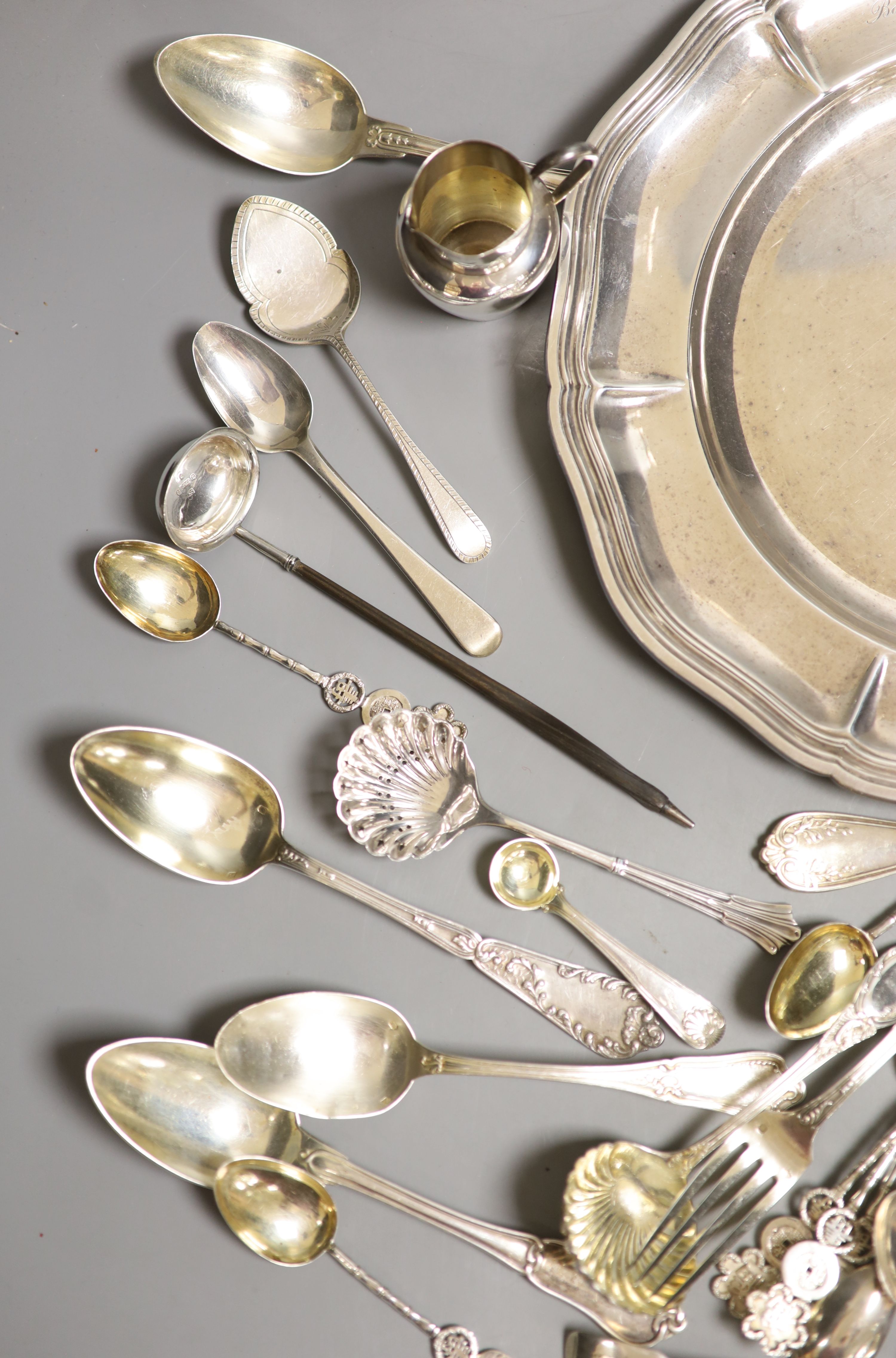 A group of assorted flatware, including some French and Chinese white metal and English silver and an Odiot 1885 white metal plate